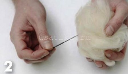 feutrage d'un chat en laine