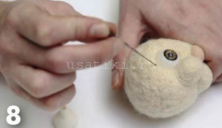 feutrage d'un chat en laine