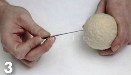 feutrage d'un chat en laine