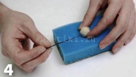 feutrage d'un chat en laine