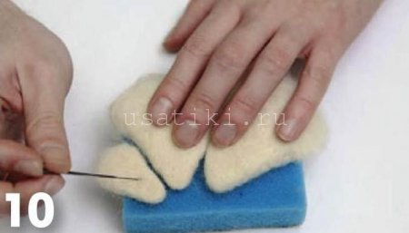 feutrage d'un chat en laine