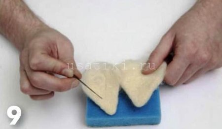 feutrage d'un chat en laine