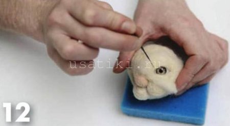 feutrage d'un chat en laine