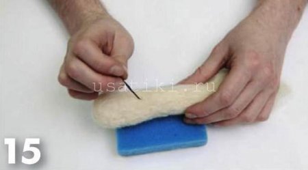 feutrage d'un chat en laine