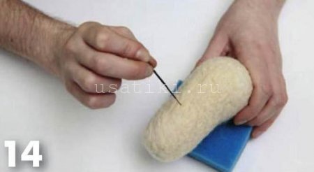 feutrage d'un chat en laine